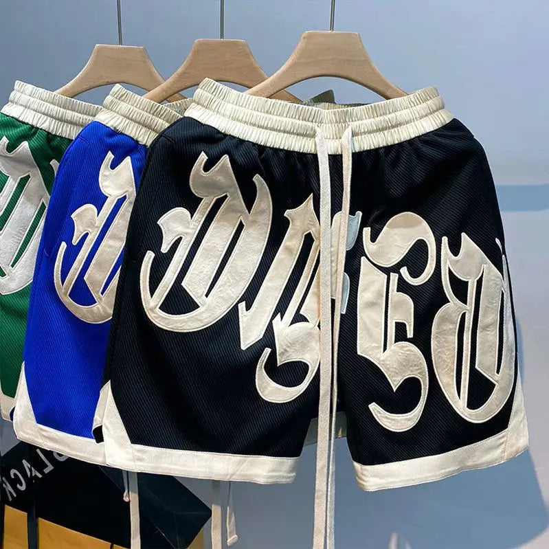 The new 2023 popular logo American joker ins summer leisure fashion men's trousers new handsome letter easy 5 minutes of pants