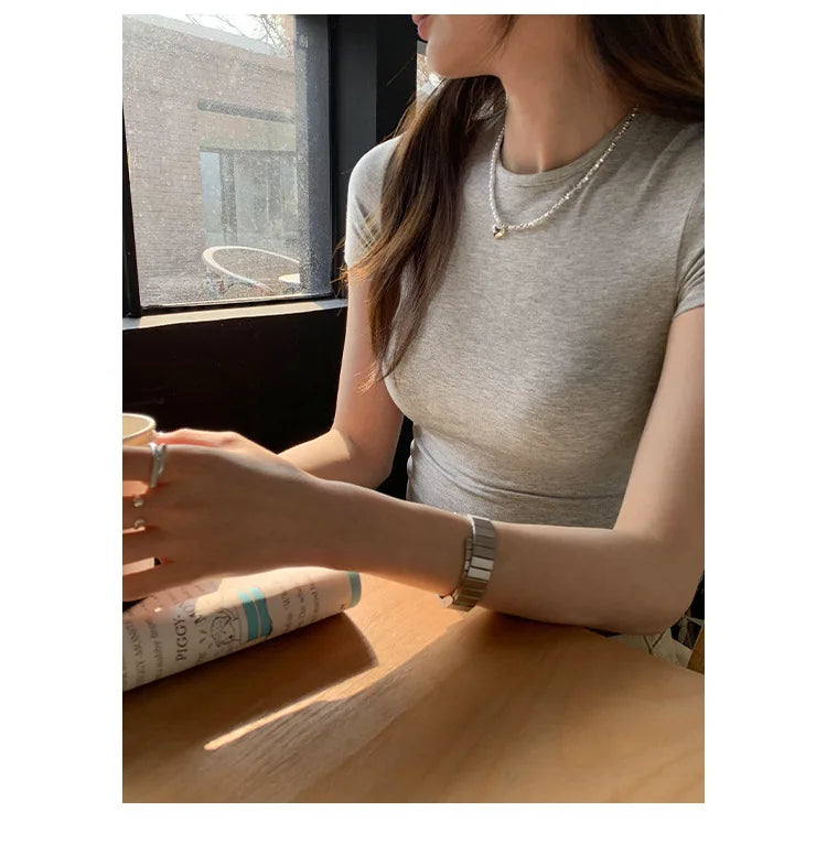 American style spicy girl shoulder T-shirt for women in summer 2025, tight fitting and slimming short top, basic elastic short s