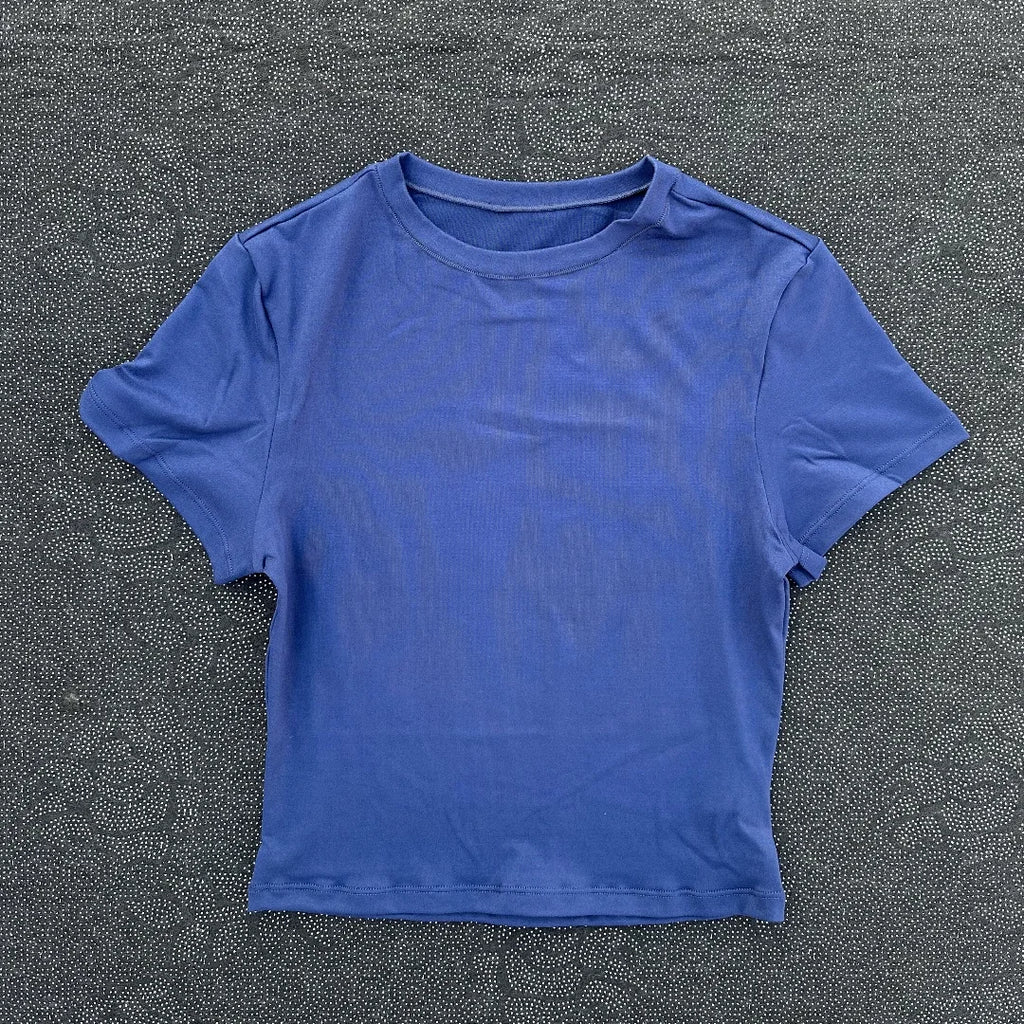 Solid color women's soft breathable yoga short-sleeved comprehensive training tight T-shirt with exposed belly button fitness sh