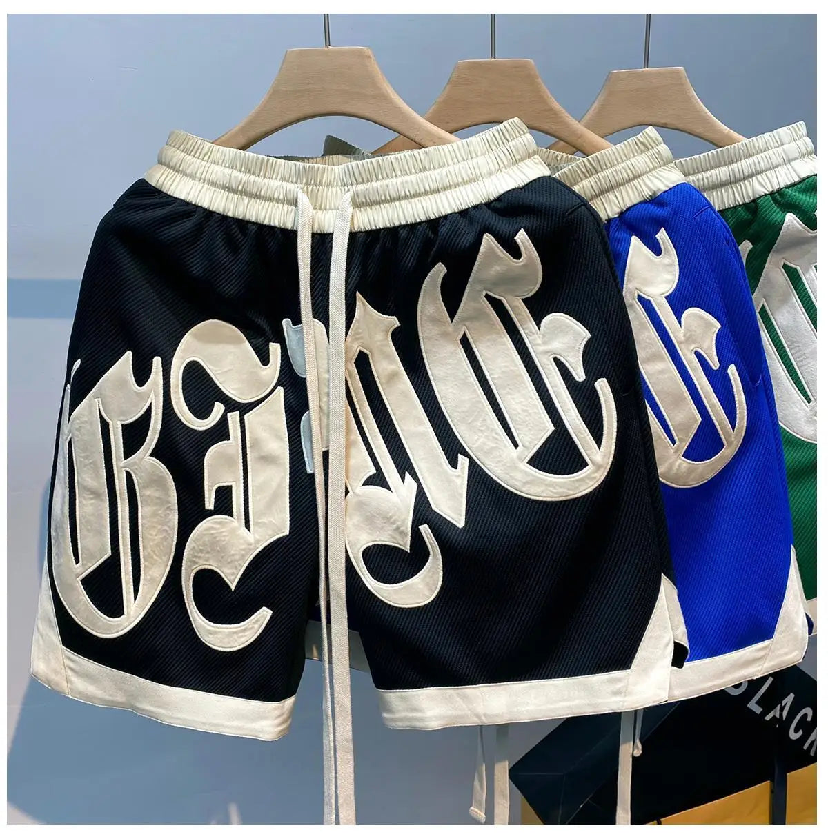 The new 2023 popular logo American joker ins summer leisure fashion men's trousers new handsome letter easy 5 minutes of pants