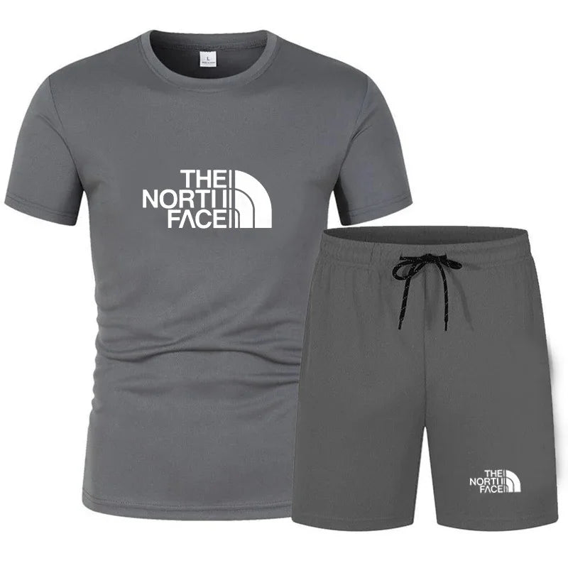 The new slim-fit men's mesh sports outfit includes a T-shirt and trousers, a two-piece set. It is a fashionable sports outfit in