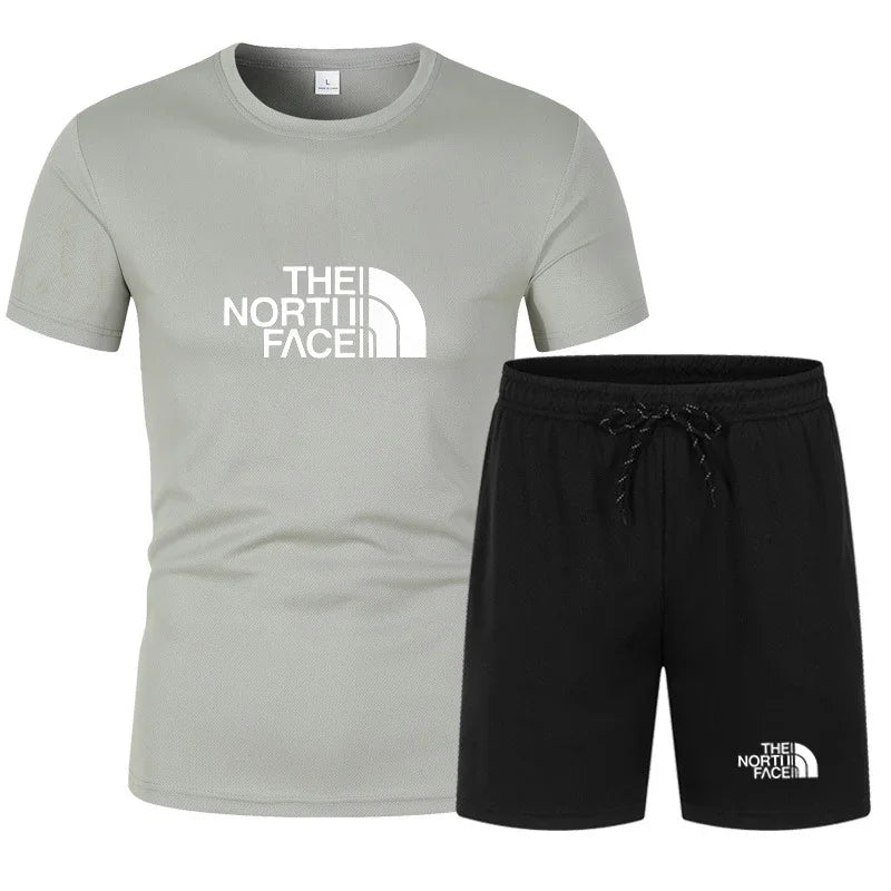 The new slim-fit men's mesh sports outfit includes a T-shirt and trousers, a two-piece set. It is a fashionable sports outfit in