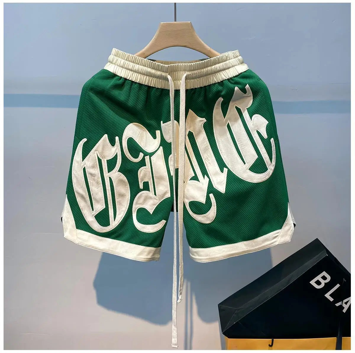 The new 2023 popular logo American joker ins summer leisure fashion men's trousers new handsome letter easy 5 minutes of pants