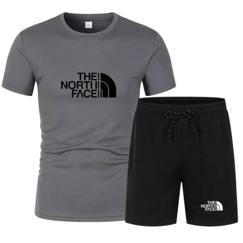 The new slim-fit men's mesh sports outfit includes a T-shirt and trousers, a two-piece set. It is a fashionable sports outfit in