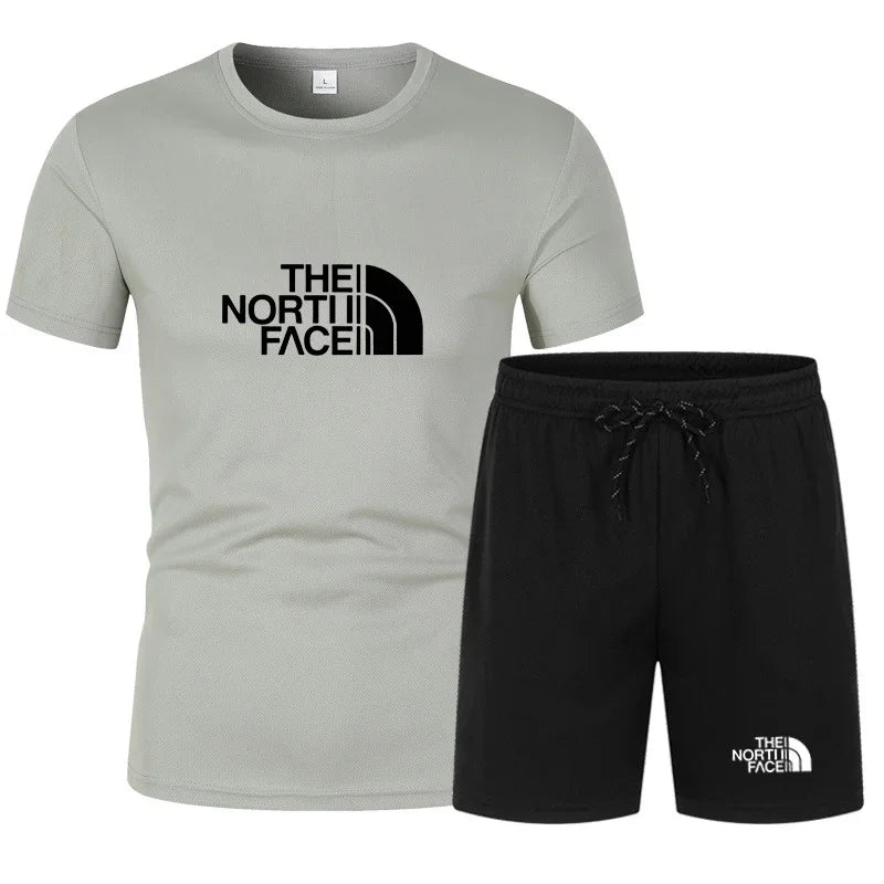 The new slim-fit men's mesh sports outfit includes a T-shirt and trousers, a two-piece set. It is a fashionable sports outfit in